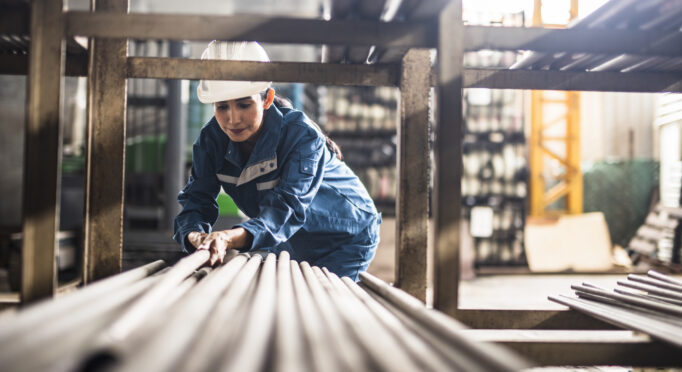 Female Steel Factory Worker at work, industrial millwrights Bloomington IL, millwright services Bloomington IL, mechanical repair Bloomington IL, equipment installation Bloomington IL, conveyor repair Bloomington IL, industrial maintenance Bloomington IL, agricultural millwright Bloomington IL, mechanical troubleshooting Bloomington IL, equipment alignment Bloomington IL, industrial equipment repair Bloomington IL, conveyor alignment Bloomington IL, grain handling repair Bloomington IL, feed system repair Bloomington IL, industrial fabrication Bloomington IL, material handling systems Bloomington IL, machinery repair Bloomington IL, mechanical contractors Bloomington IL, millwright contractor Bloomington IL, industrial equipment installation Bloomington IL, mechanical system conditioning Bloomington IL