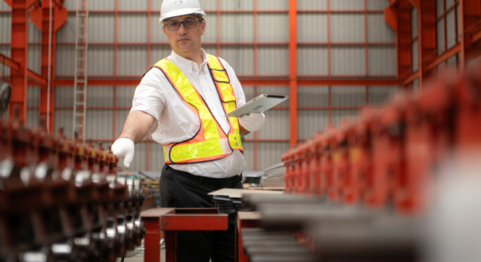 Senior experienced technician checking large machine on a production line at an industrial factory, industrial millwrights Springfield IL, millwright services Springfield IL, mechanical repair Springfield IL, equipment installation Springfield IL, conveyor repair Springfield IL, industrial maintenance Springfield IL, agricultural millwright Springfield IL, mechanical troubleshooting Springfield IL, equipment alignment Springfield IL, industrial equipment repair Springfield IL, conveyor alignment Springfield IL, grain handling repair Springfield IL, feed system repair Springfield IL, industrial fabrication Springfield IL, material handling systems Springfield IL, machinery repair Springfield IL, mechanical contractors Springfield IL, millwright contractor Springfield IL, industrial equipment installation Springfield IL, mechanical system conditioning Springfield IL
